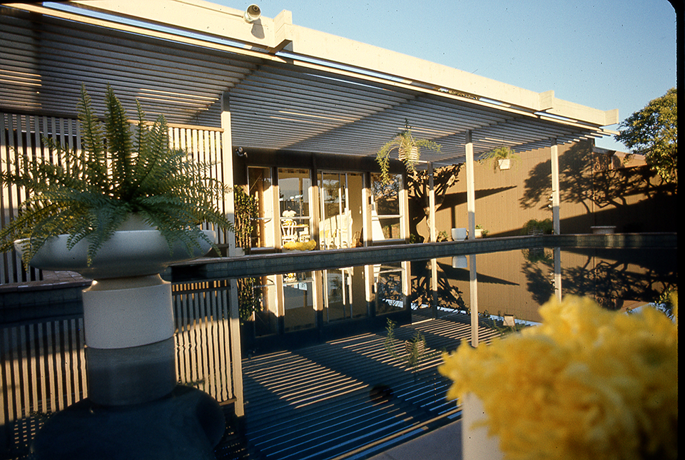 Low Angle View of Swiming Pool Looking Towards the Family Room